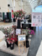 Garden Path floral pop-up display with potted flowers