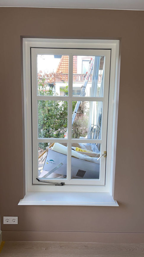Muurverf en lak aangebracht in een chique huis