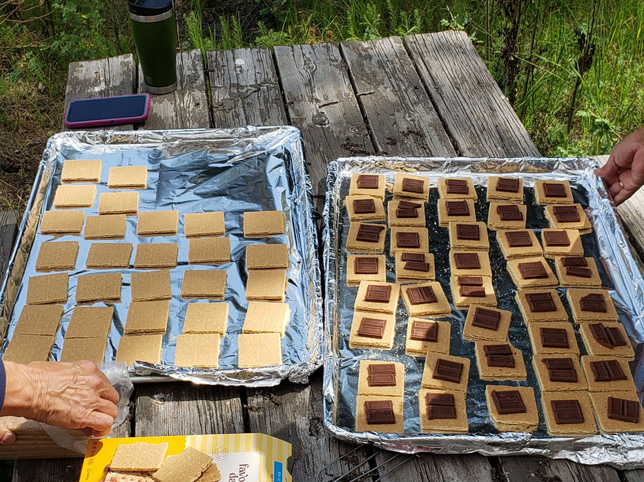 trays of graham crackers with chocolate pieces on top