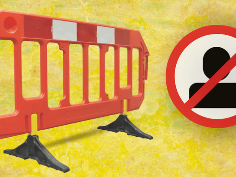 Orange barricade next to a red circular no-entry sign with a person icon. Background is textured yellow, conveying caution.