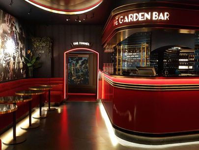 The Garden Cinema in London, showcasing Art Deco cinema design by Muzo Design, with bar and bespoke banquette seating
