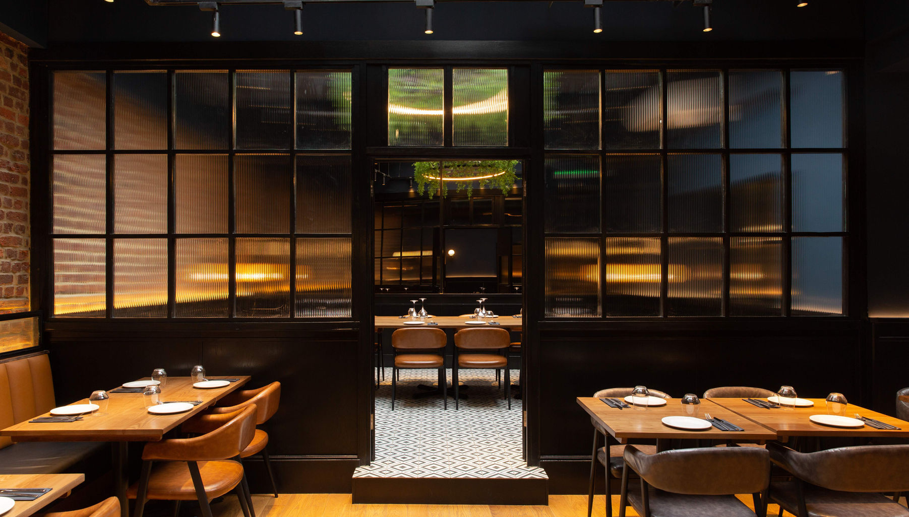 Interior Design London, skylight, feature light, fake plants, dark wood, exposed bricks, private dining room, PDR