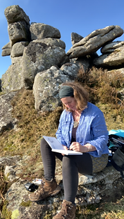 Artist Charlotte Ellis sketching on Dartmoor