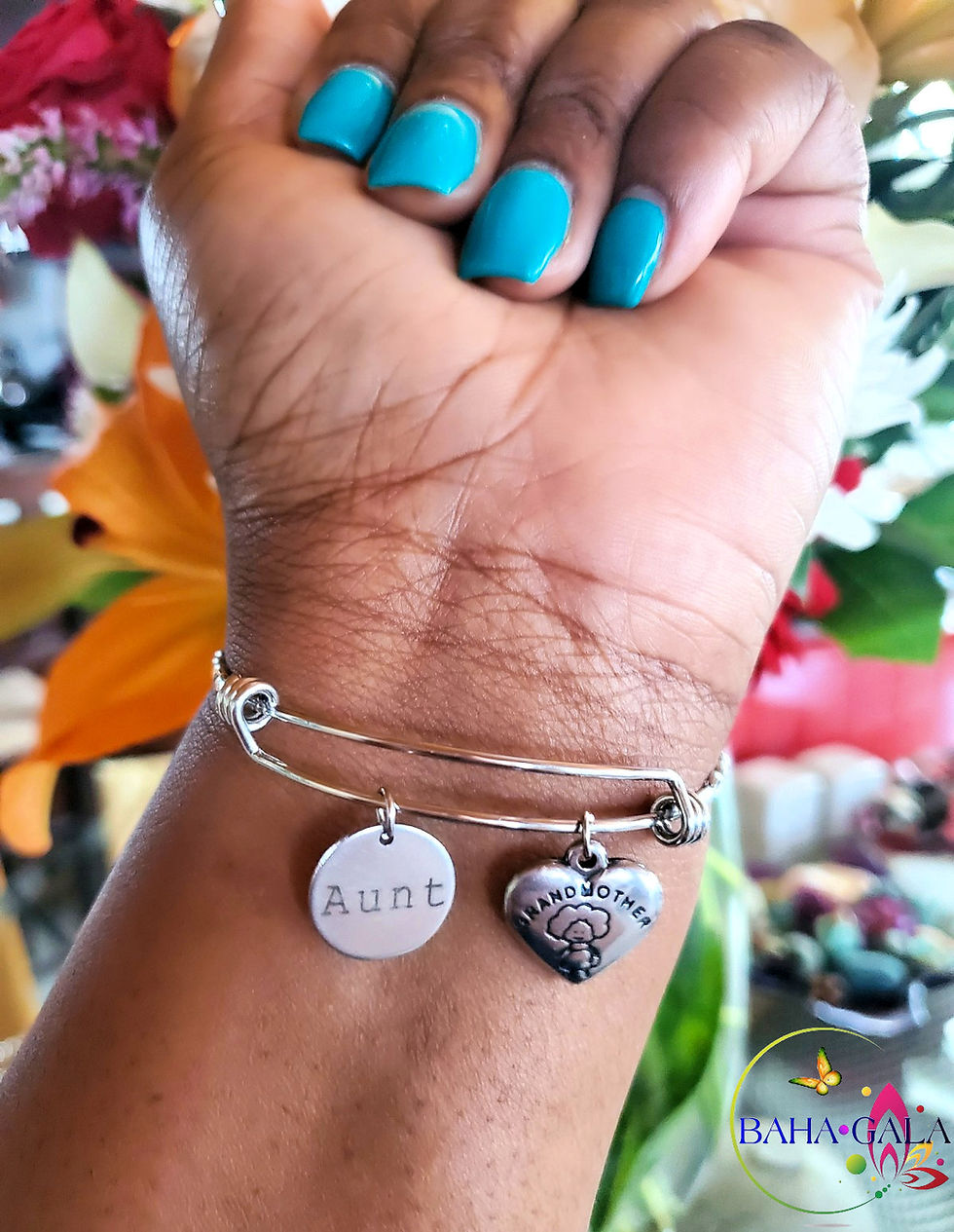 Thumbnail: BG "Inspire" Stainless Steel "Butterfly Twist" Adjustable Charm Bangle.