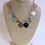 Thumbnail: Authentic Bahamian Coins & Charm Necklace & Earring Set.