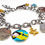 Thumbnail: Authentic Bahamian Coins & Charm Stainless Steel Bracelet.