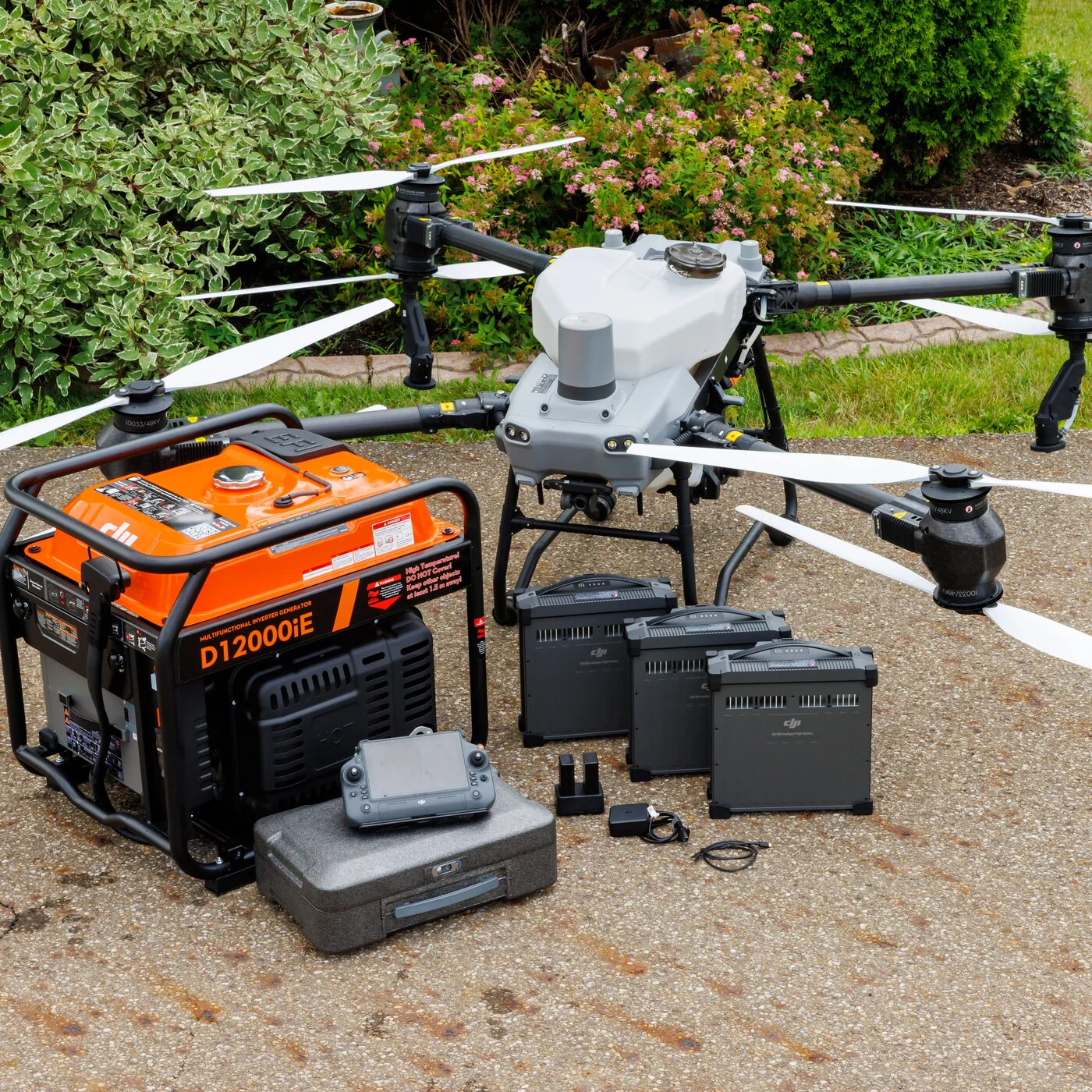 The set of agricultural drone with extra batteries and the generator