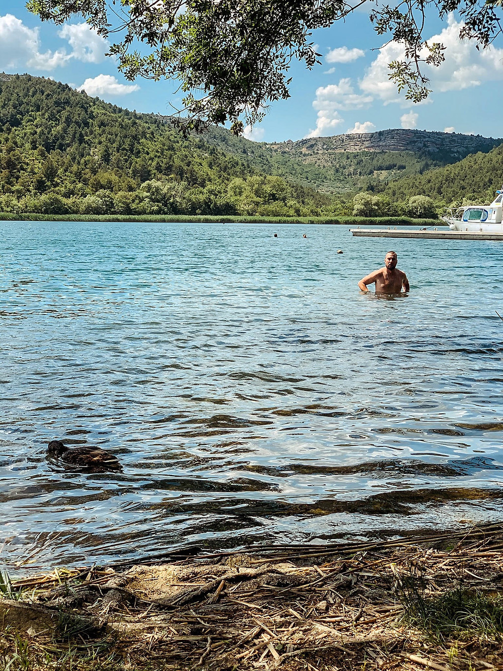 A frigid swim in the waters under Roški Slap