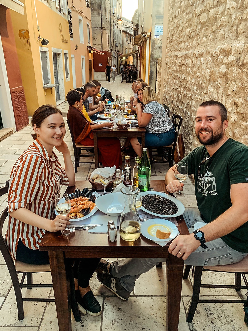 Cuttlefish risotto and carafes of wine in Zadar!