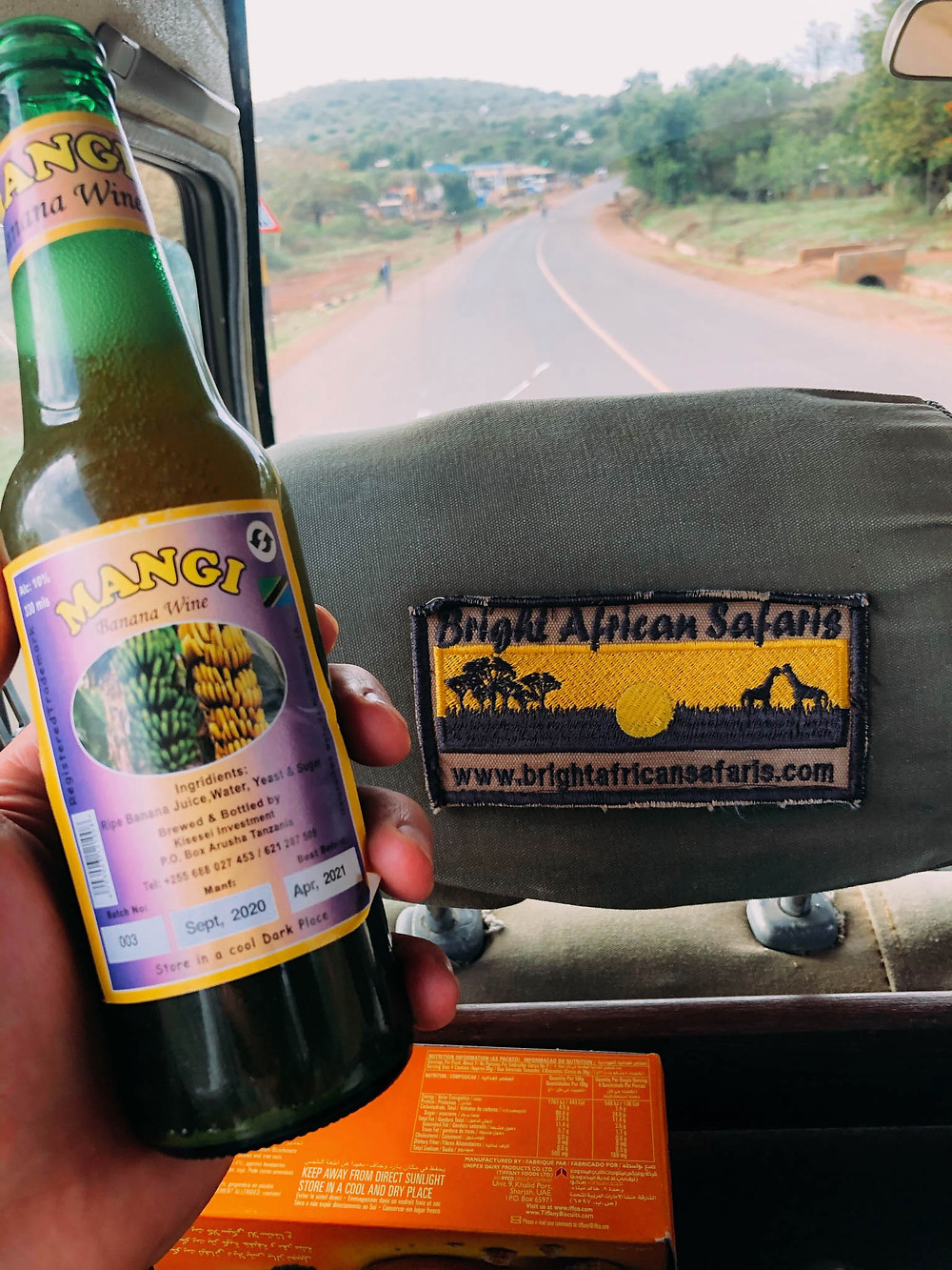 Enjoying some delicious banana wine on the way to Ngorongoro