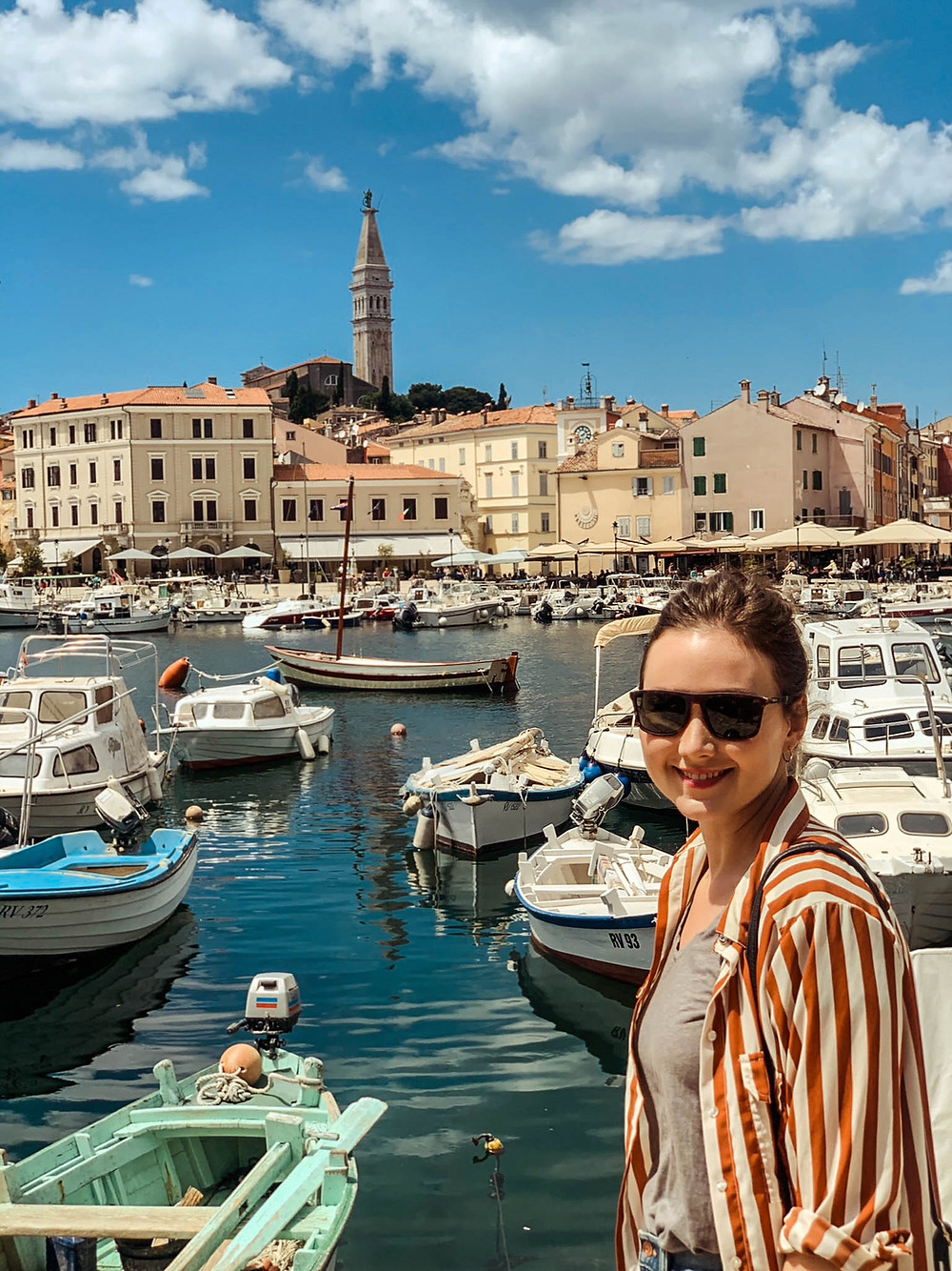 In Rovinj with the tower of St. Euphemia's Cathedral in the background