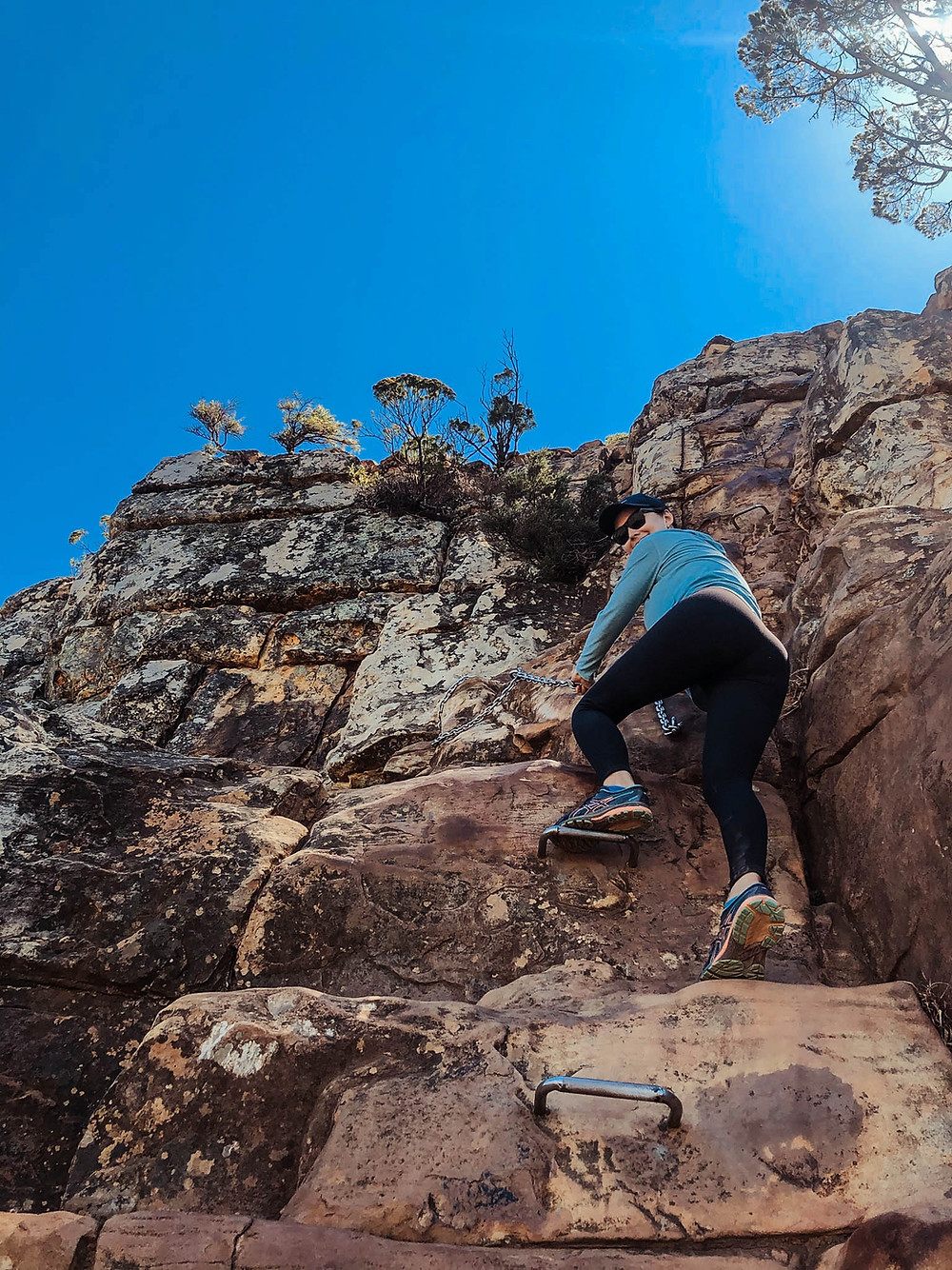 Jenna, quite sportingly, climbing up some of the more technical parts of Lion's Head
