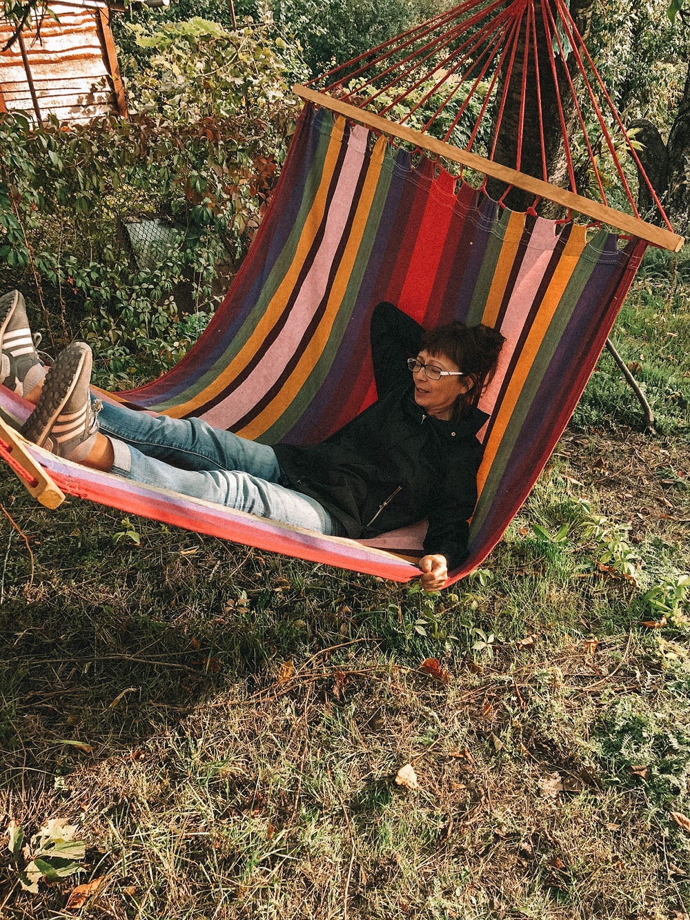 Jenna's mom, testing out the new hammock