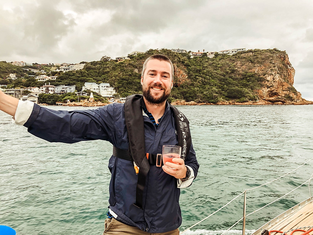 Sailing out through the Knysna Heads - eastern head in the background