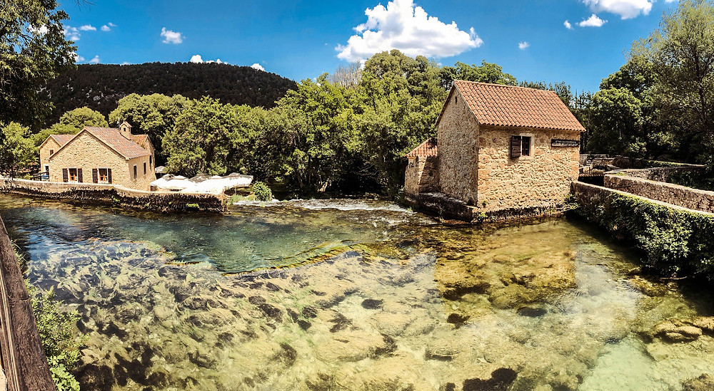 Krka's historic mill shoot and overlooking cafe