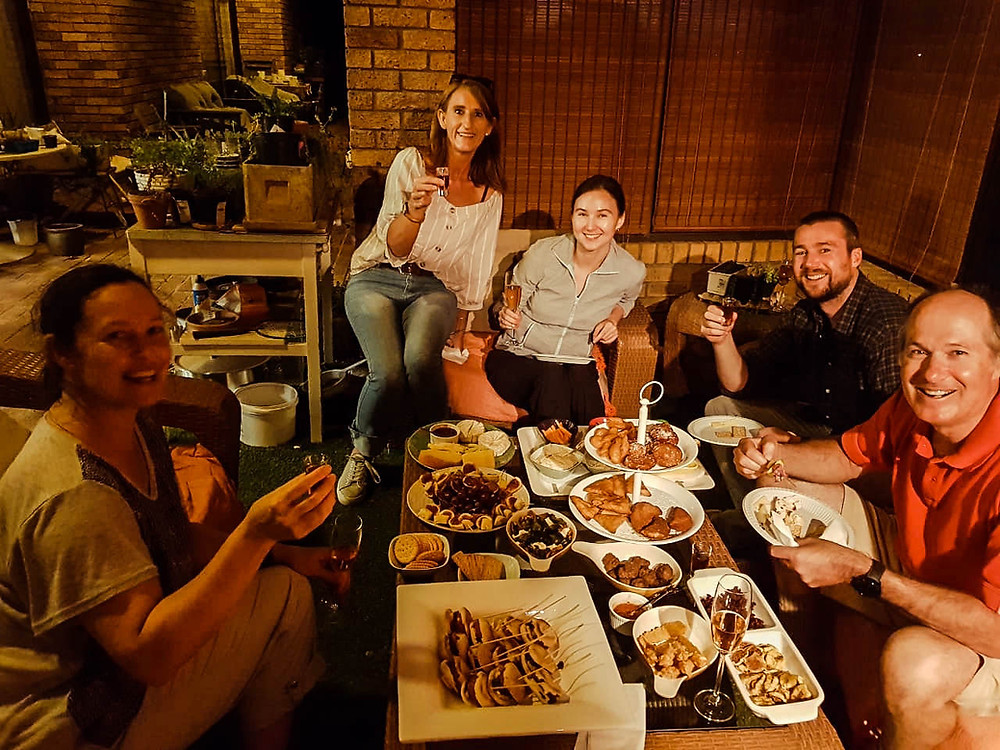 Enjoying an incredible array of snacks and wine with Natasha, Marleen, and Chris