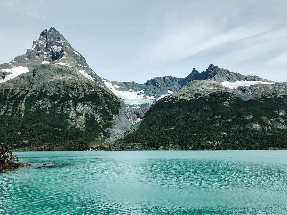 Turquoise water with mountains in the background at Perito Moreno, Argentina