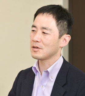 飯田 哲夫