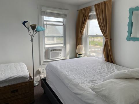 North facing bedroom with full and twin beds
