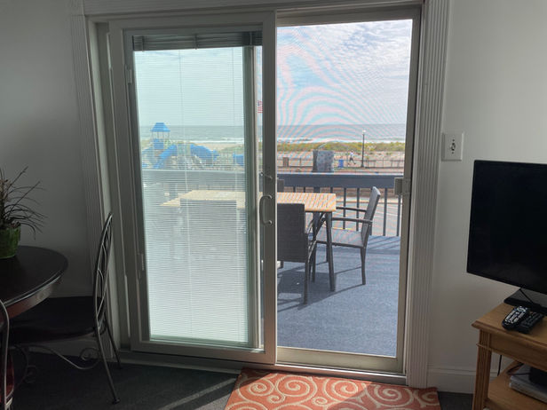 Sliding doors onto the balcony from living room