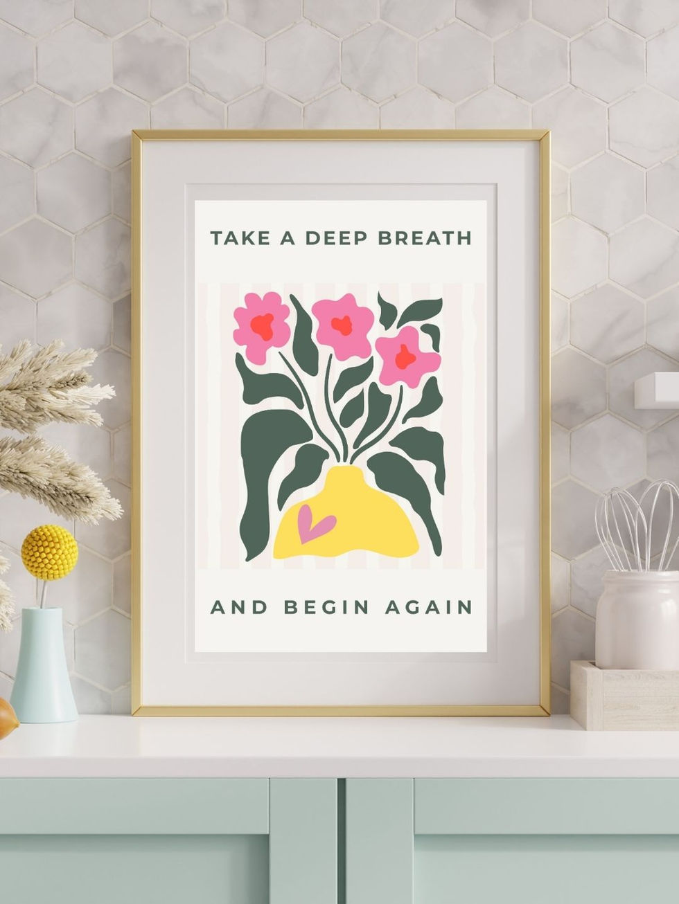 Framed floral artwork with motivational text.