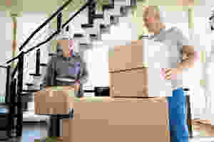 senior couple with moving boxes