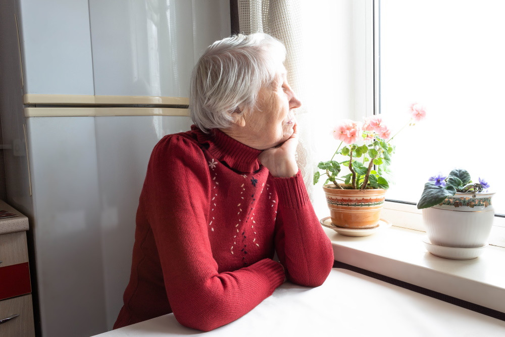 senior woman sitting at home