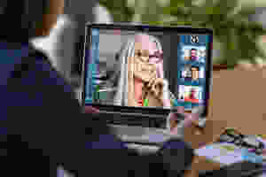 senior woman on group video conferencing screen