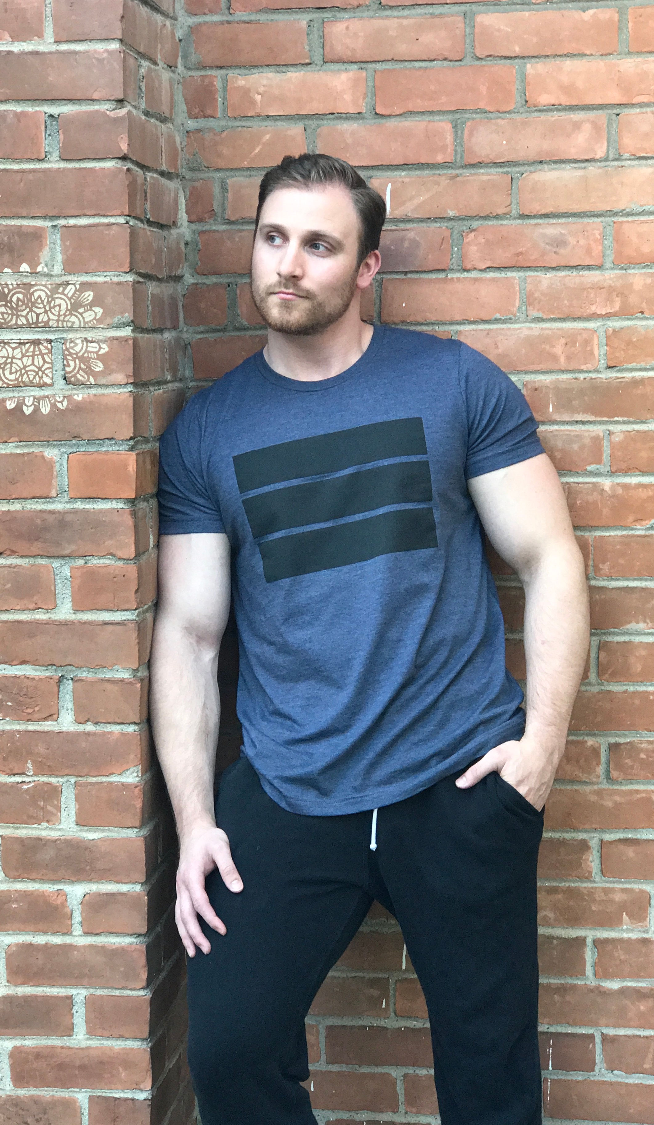 blue unisex t-shirt with black logo