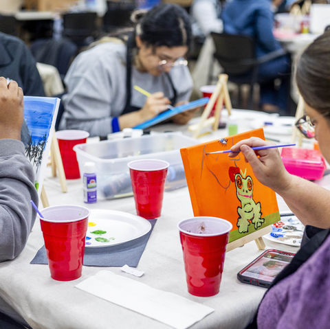 A Canvas Carousel Art Class for a Corporate Event