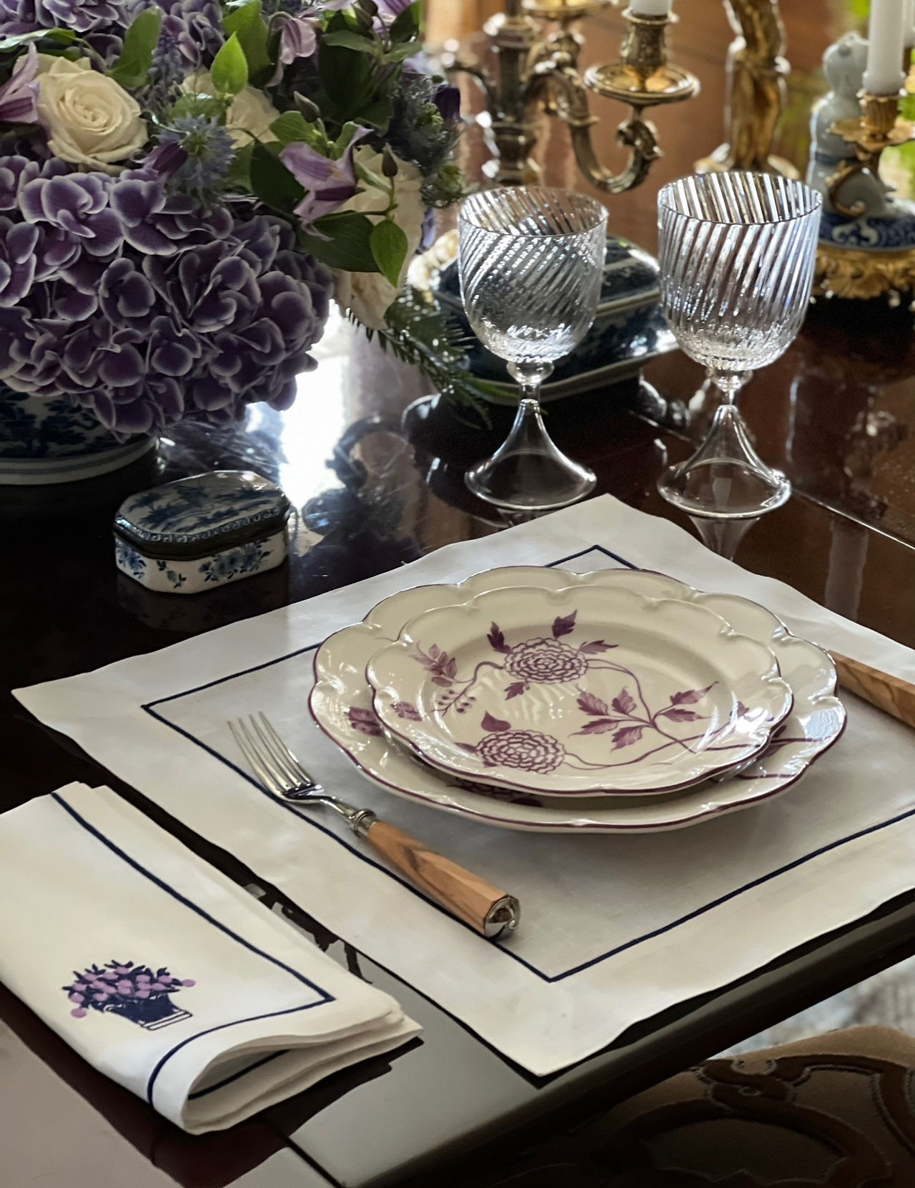 Climbing Peonies in Purple with beautiful linens