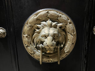 Lion’s Head Door Knockers. Welcoming? Or menacing?
