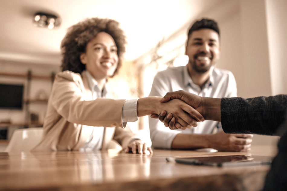 business-handshake-between-professionals-at-wooden-2026-03-09-23-40-43-utc_edited.jpg