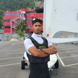 Youth Worlds debut (Oman 2021 – ILCA 6); 2022 National Laser Radial Champion; Bronze medal at 2024 Caribbean Dinghy Championship (ILCA fleets); Level 1 Sailing Coach.
Stefan Stüven is one of Trinidad & Tobago’s standout dinghy sailors, known for his drive on the water and his commitment to raising the standard locally. He made his Youth Worlds debut at the Youth Sailing World Championships in Oman (2021), competing in the men’s Laser Radial (ILCA 6) after being invited through World Sailing’s Emerging Nations Programme.
Since then, Stefan has continued to build momentum—earning the men’s Laser Radial title at the 2022 National Sailing Championship and proving he can perform under pressure at home and abroad. More recently, he secured bronze at the 2024 Caribbean Dinghy Championship in the ILCA fleets, battling right up front through the final day.
Off the water, Stefan is also a Level 1 sailing coach, giving back to the next generation while keeping his own sights set on the biggest goals ahead—Olympic dreams from LA 2028 to Brisbane 2032.