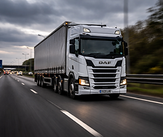 A lorry driving on a UK motorway taking freight to a destination