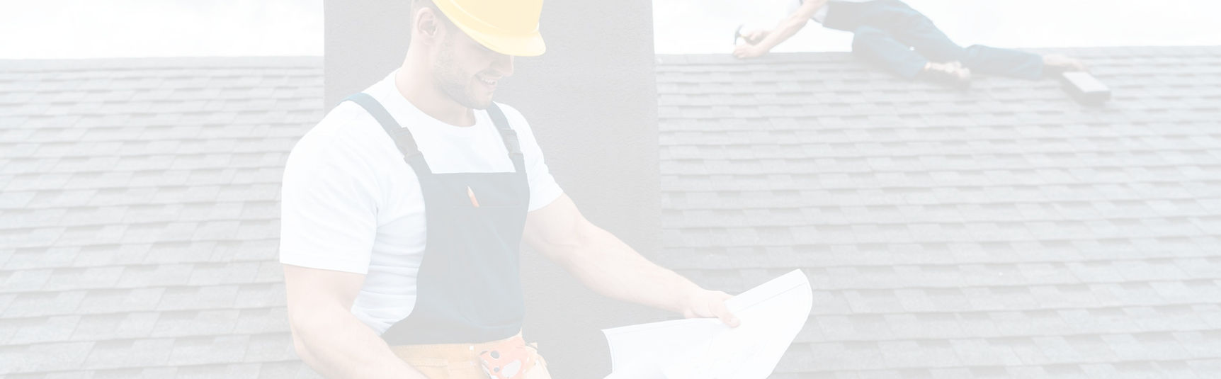 panoramic-shot-of-handsome-builder-holdi