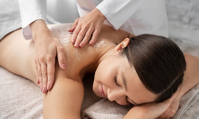 high-angle-woman-getting-massaged-spa (1).jpg