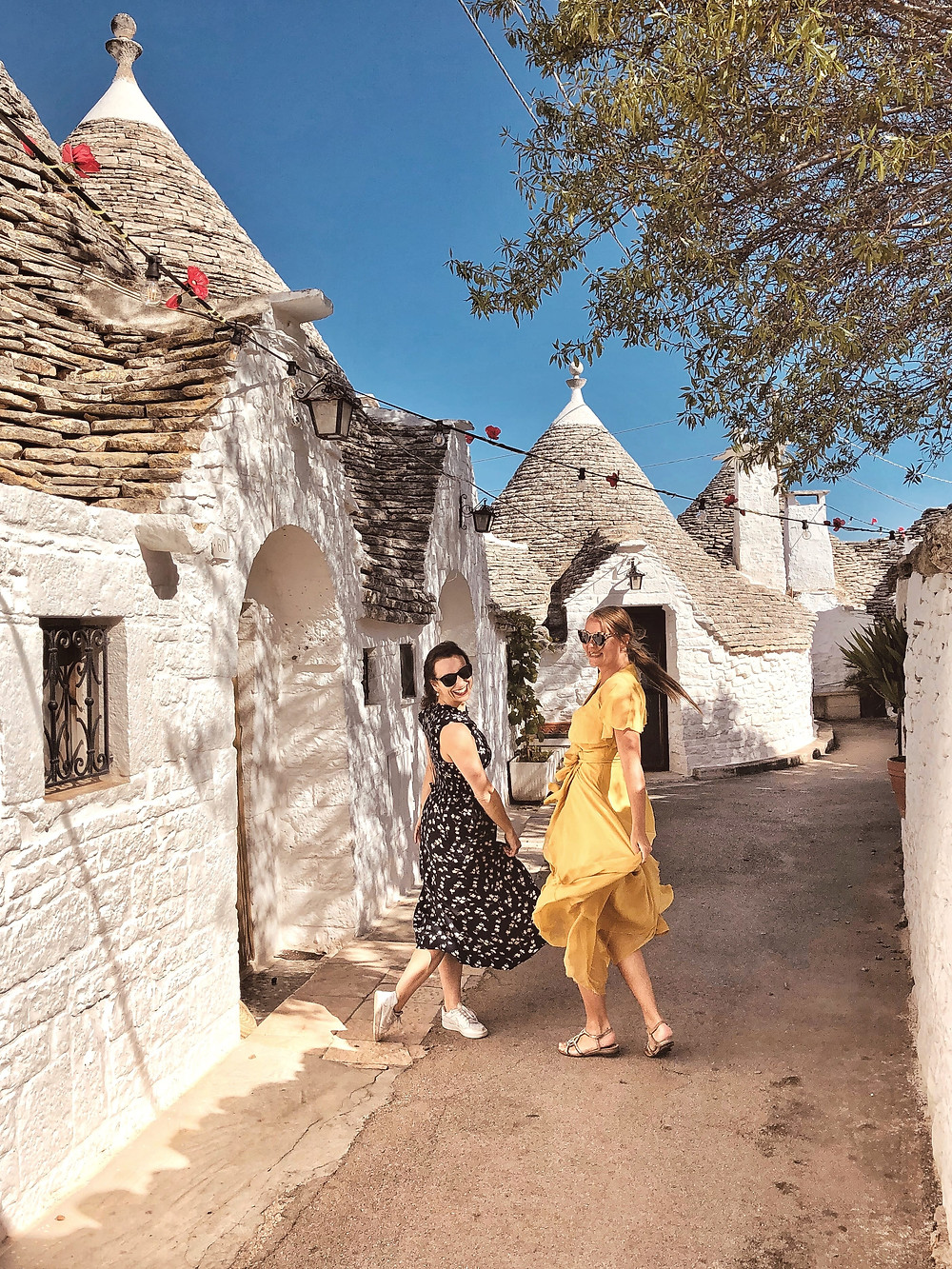 Dancing in the alleys of Alberobello-Puglia Italy