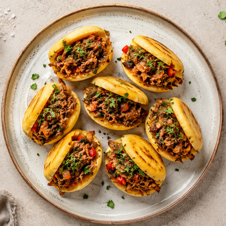 Arepas rellenas de carnitas de pato confitado