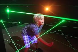 little boy in the laser maze