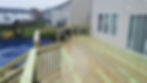 two tiered pool deck w/ green treated wood