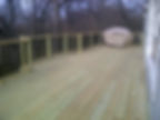 wrap around deck w/ green treated wood