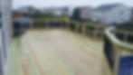 two tiered pool deck w/ green treated wood
