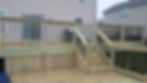 two tiered pool deck w/ green treated wood