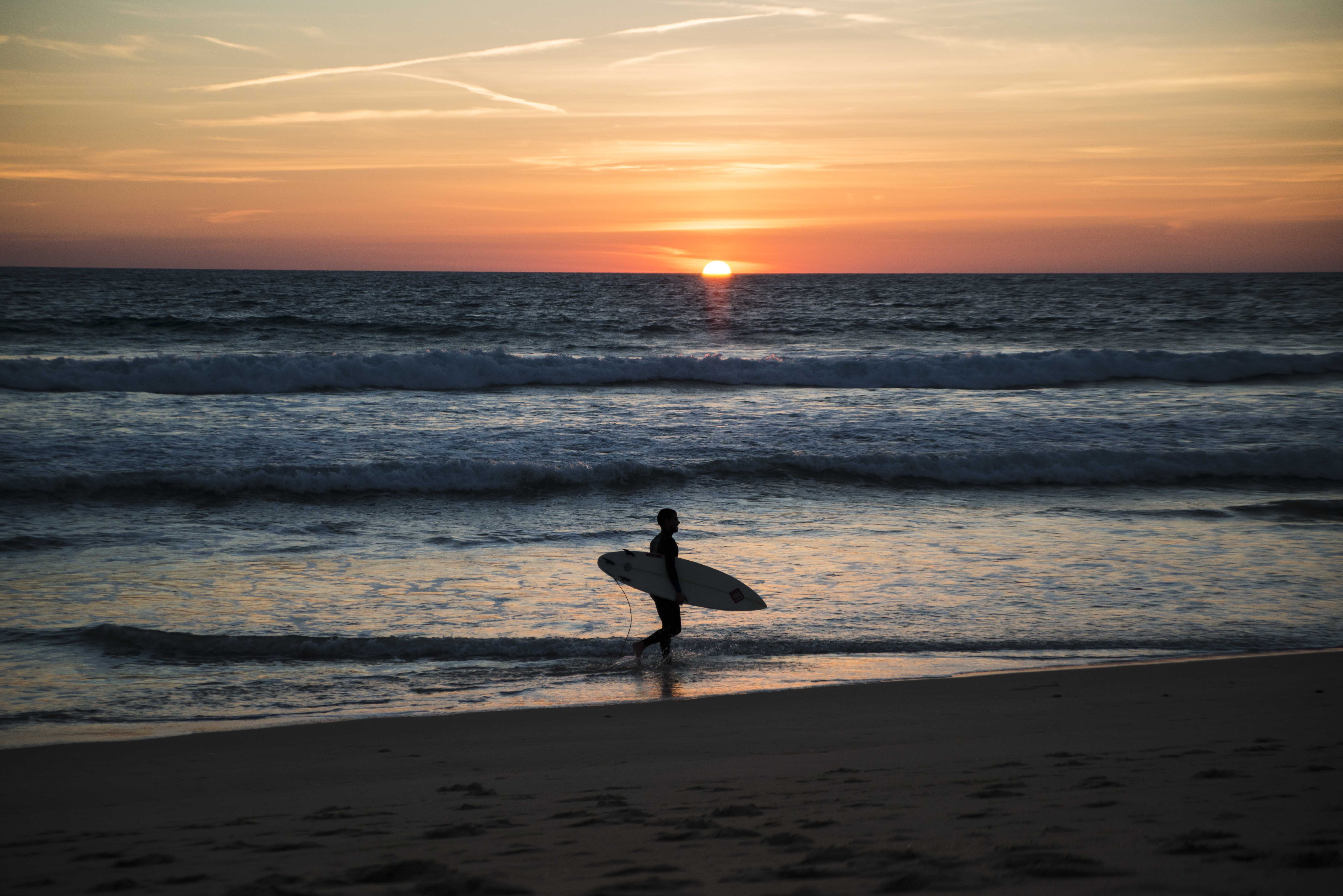 Surfing during the sunset