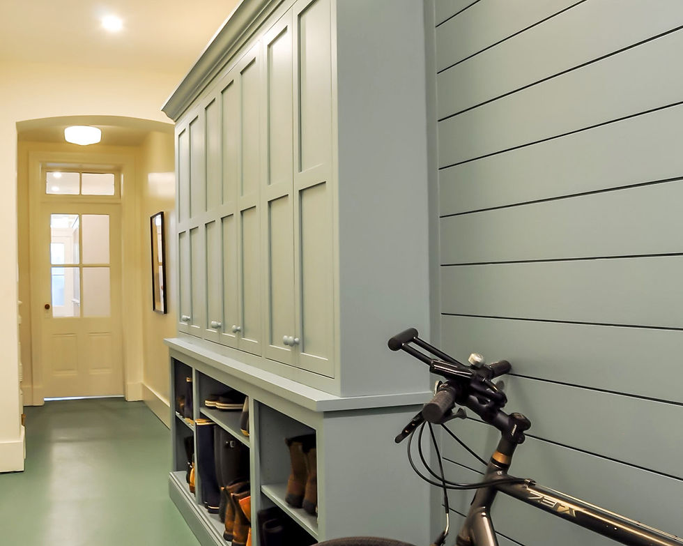 Basement renovation in Georgetown, Washington DC featuring new cabinetry for organization and storage