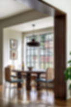 Dining nook with large window and contemporary furniture