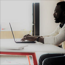 Learn about different careers that might interest you. Shown: Man at laptop.