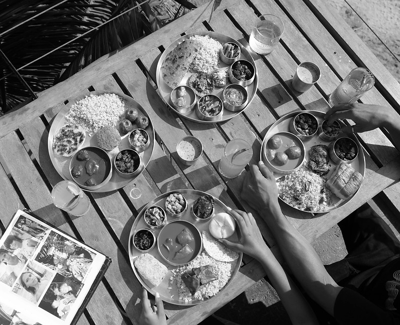 Slow Tide plates of food on table