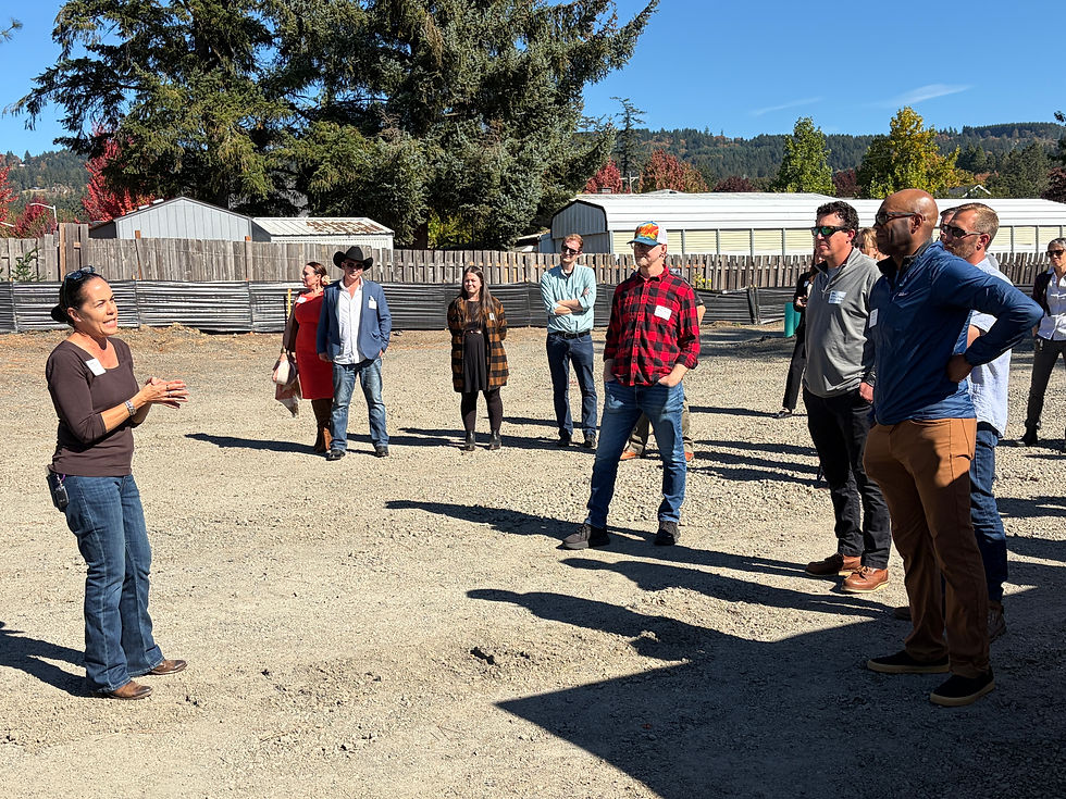DLCD Director, Brenda Bateman, provides a housing initiative update to attendees touring HIVE in Newberg.